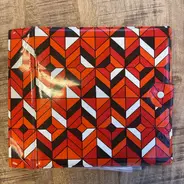 Vintage Schallplattenalbum - mit geometrischen Muster in rot-weiß-orange-schwarz, für 16 Singles