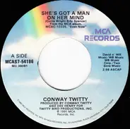 Conway Twitty - She's Got A Man On Her Mind / You Put It There