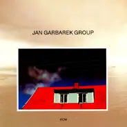 Jan Garbarek Group - Photo with Blue Sky, White Cloud, Wires, Windows and a Red Roof